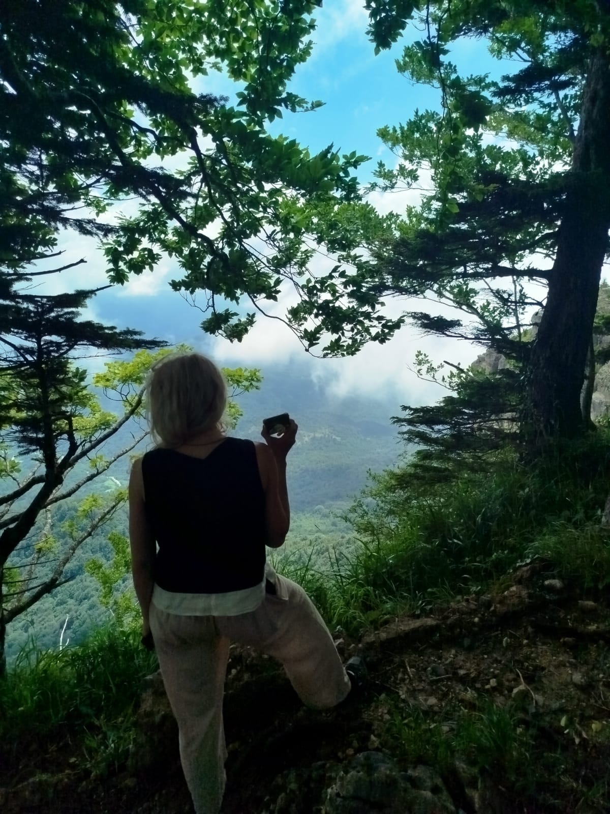 Hiking through the forest towards Tskhrajvari peak